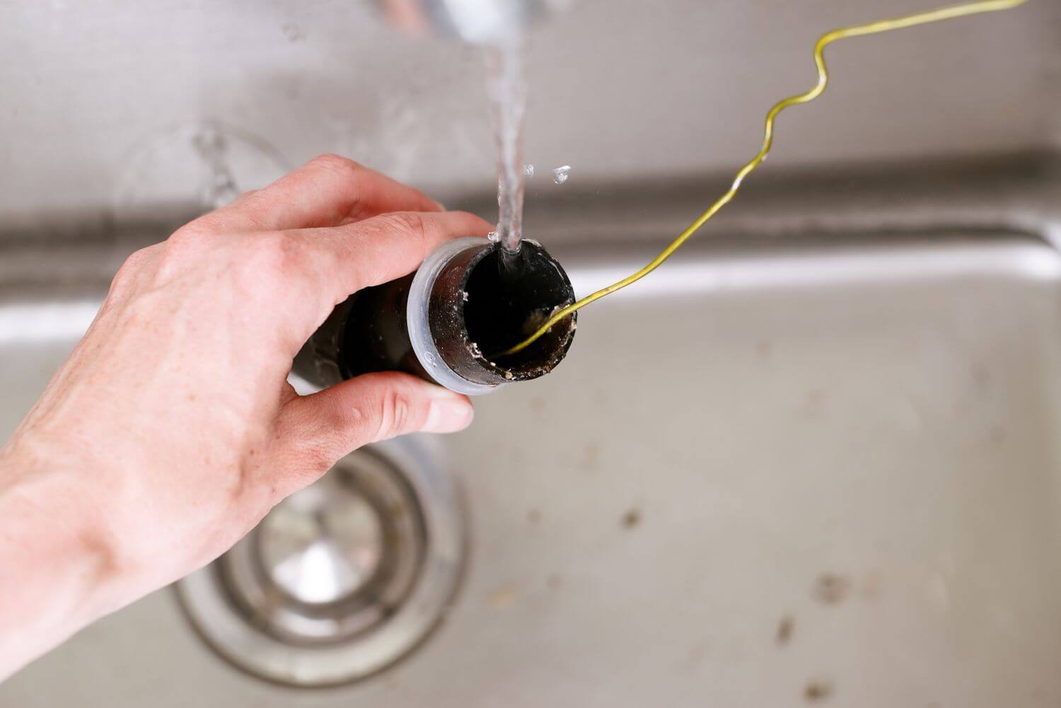 how do you unclog a garbage disposal